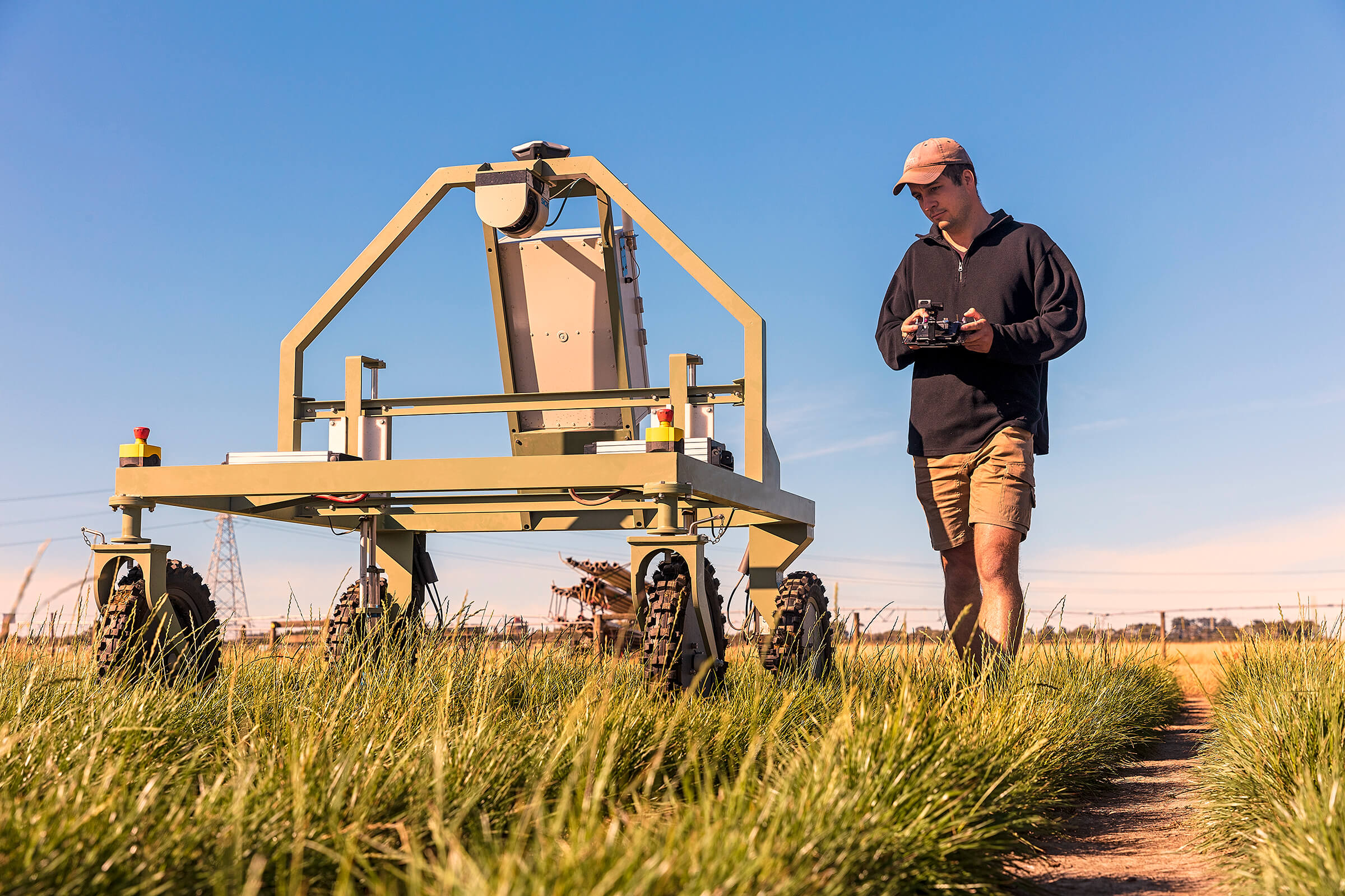 Hero Agriculture Farmer Walking Beside Machine
