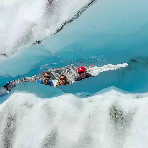 Fox Glacier Couple Peaking Through Ice