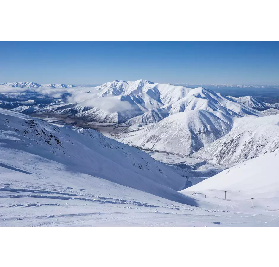 Large slopes at Porters with lifts in the background.